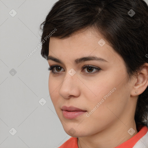 Neutral white young-adult female with medium  brown hair and brown eyes