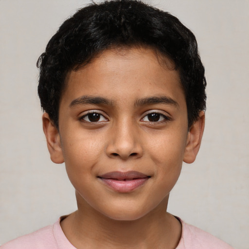 Joyful latino child female with short  brown hair and brown eyes