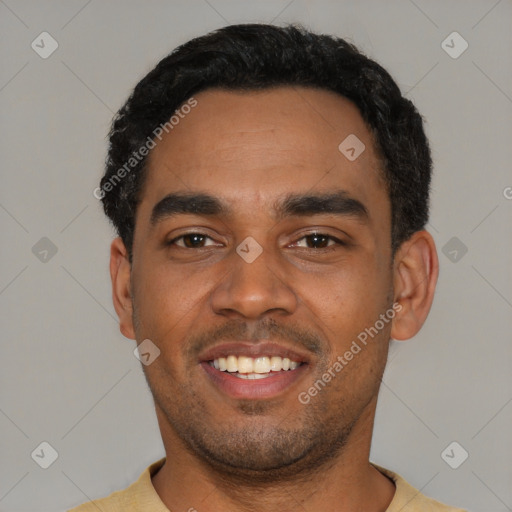 Joyful latino young-adult male with short  black hair and brown eyes