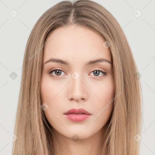 Neutral white young-adult female with long  brown hair and brown eyes