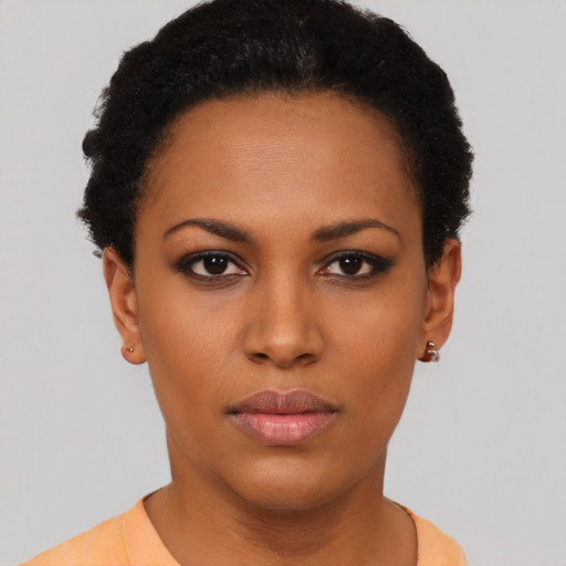 Neutral black young-adult female with short  black hair and brown eyes
