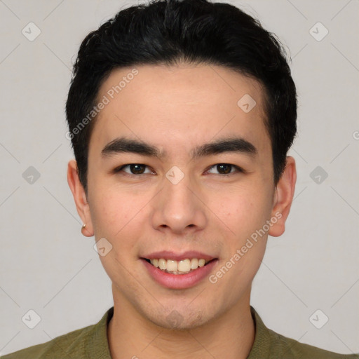 Joyful asian young-adult male with short  black hair and brown eyes