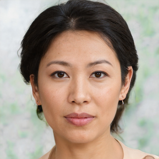 Neutral asian young-adult female with short  brown hair and brown eyes