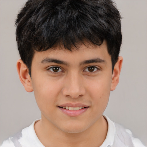 Joyful white child male with short  brown hair and brown eyes