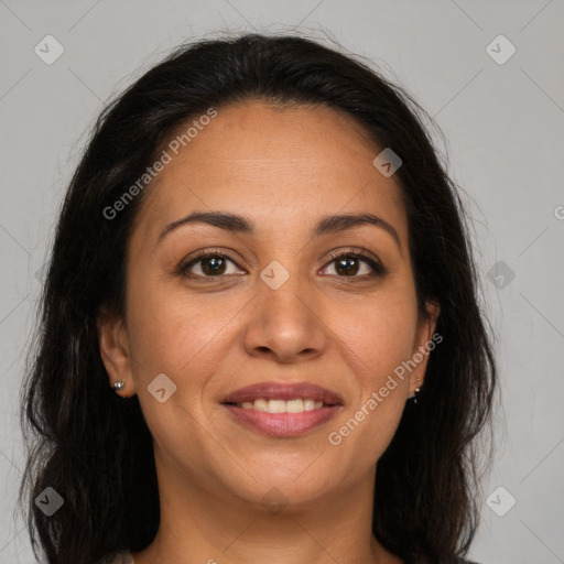 Joyful latino young-adult female with medium  brown hair and brown eyes