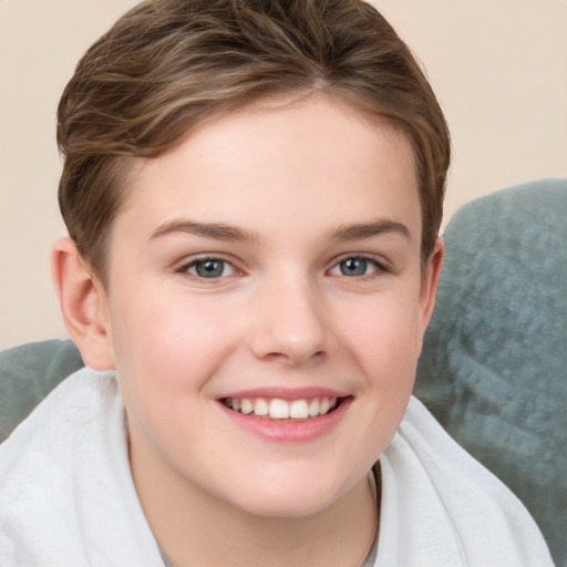 Joyful white child female with short  brown hair and grey eyes