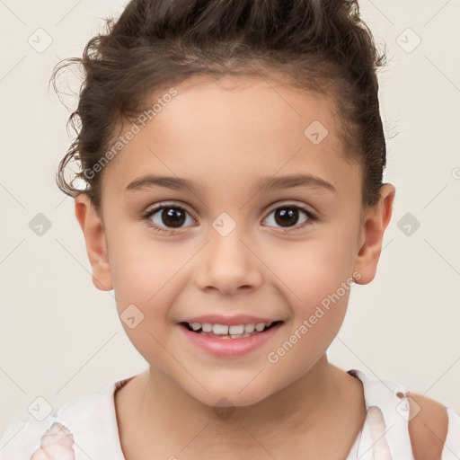 Joyful white child female with short  brown hair and brown eyes