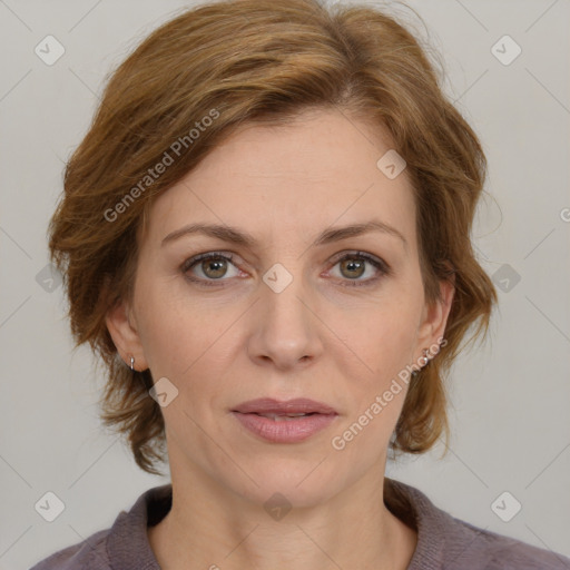 Joyful white adult female with medium  brown hair and grey eyes