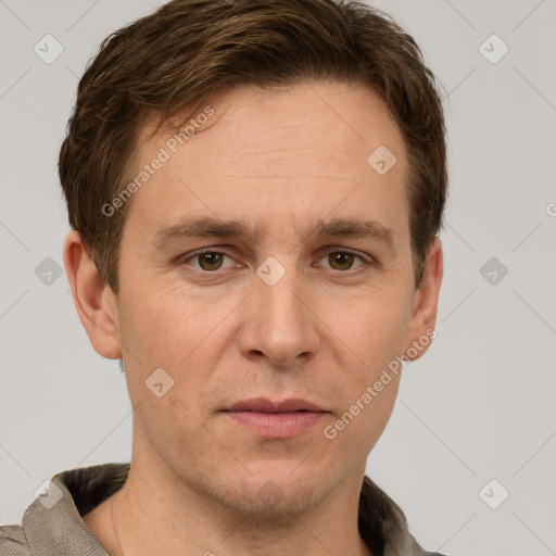 Joyful white adult male with short  brown hair and grey eyes