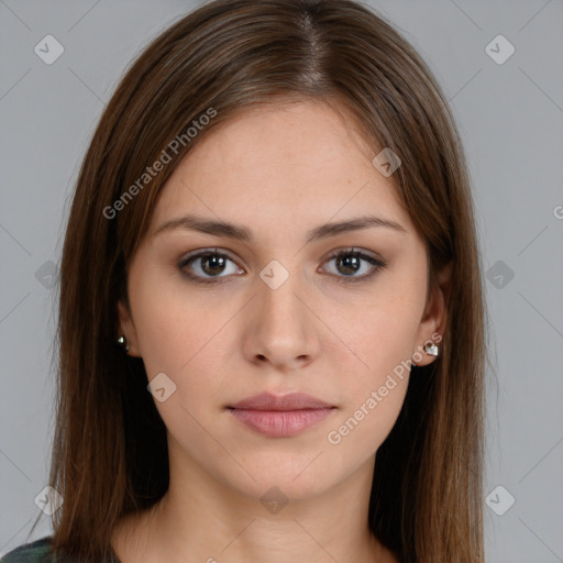 Neutral white young-adult female with long  brown hair and brown eyes