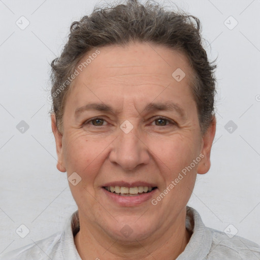 Joyful white adult female with short  brown hair and brown eyes