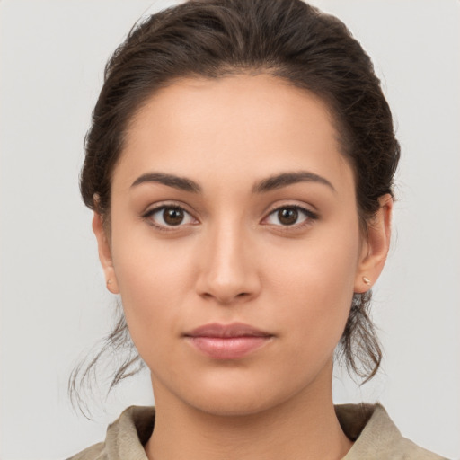 Neutral white young-adult female with medium  brown hair and brown eyes