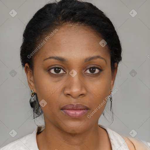 Joyful black young-adult female with medium  brown hair and brown eyes