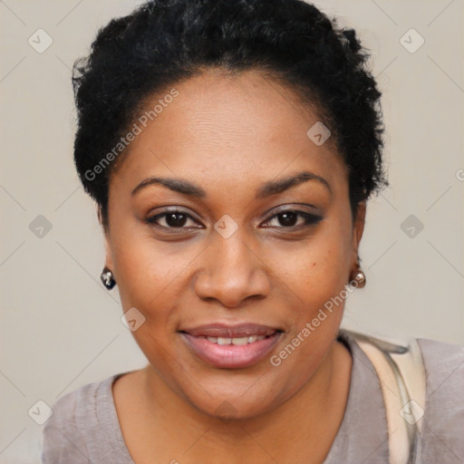 Joyful black young-adult female with short  black hair and brown eyes