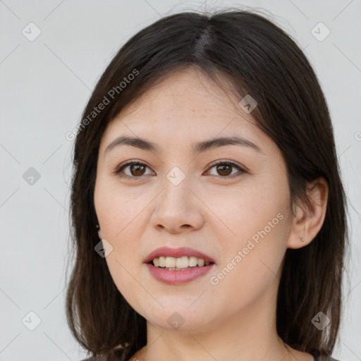 Joyful white young-adult female with medium  brown hair and brown eyes