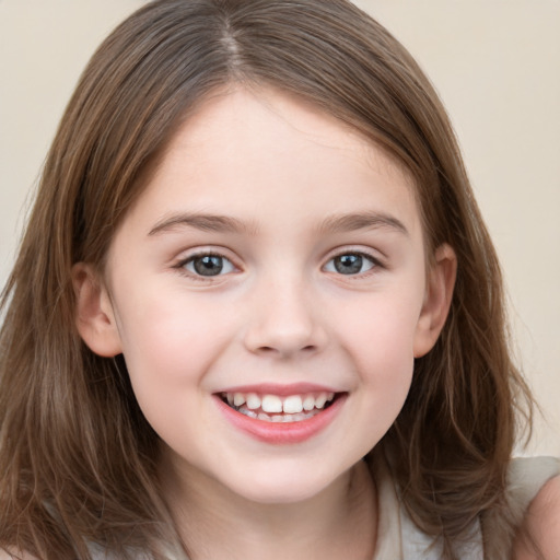 Joyful white child female with medium  brown hair and brown eyes