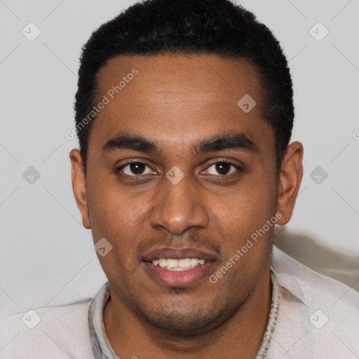 Joyful black young-adult male with short  black hair and brown eyes