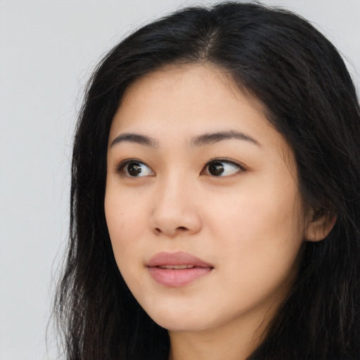 Neutral asian young-adult female with long  black hair and brown eyes