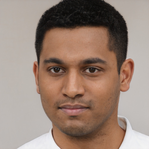 Neutral black young-adult male with short  black hair and brown eyes