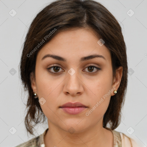 Neutral white young-adult female with medium  brown hair and brown eyes