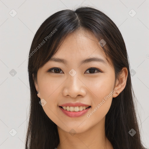 Joyful asian young-adult female with long  brown hair and brown eyes