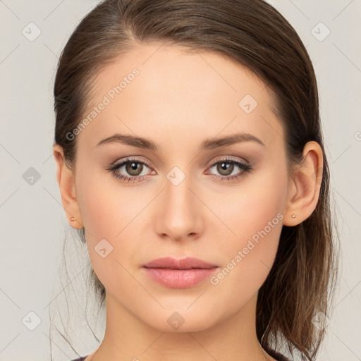 Neutral white young-adult female with long  brown hair and brown eyes