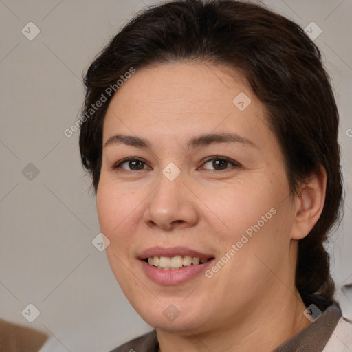 Joyful white adult female with medium  brown hair and brown eyes