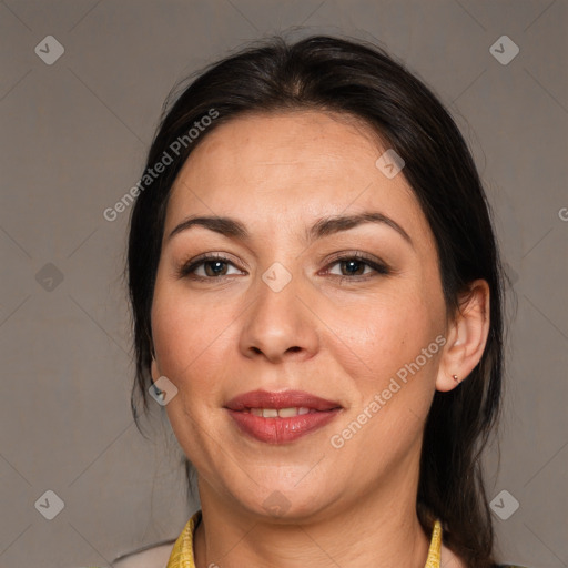 Joyful white adult female with medium  brown hair and brown eyes