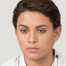 Neutral white young-adult female with short  brown hair and brown eyes