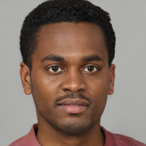 Neutral black young-adult male with short  brown hair and brown eyes