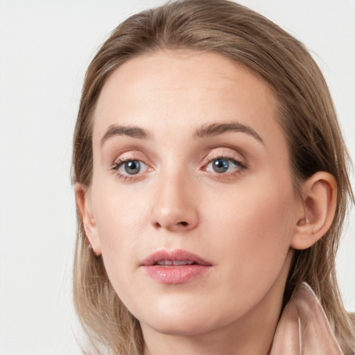 Neutral white young-adult female with long  brown hair and grey eyes