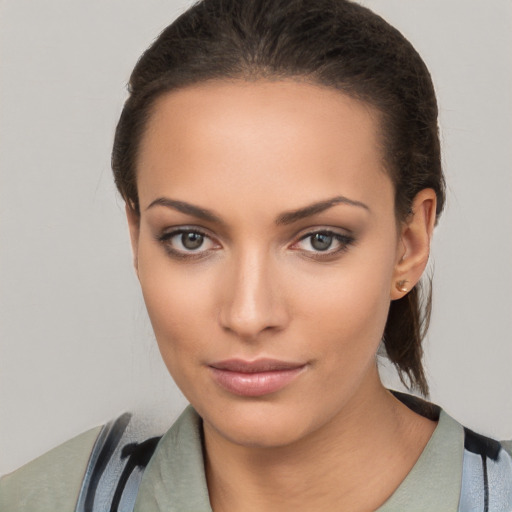 Neutral white young-adult female with long  brown hair and brown eyes