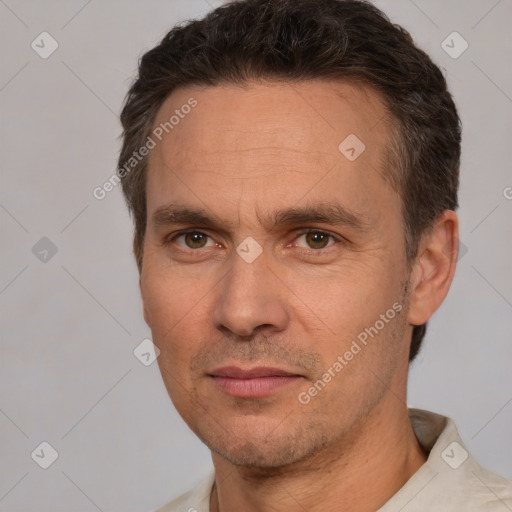 Neutral white adult male with short  brown hair and brown eyes