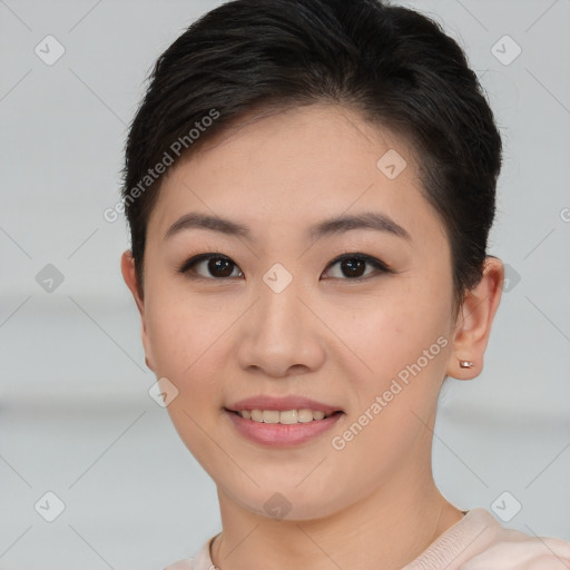 Joyful asian young-adult female with short  brown hair and brown eyes