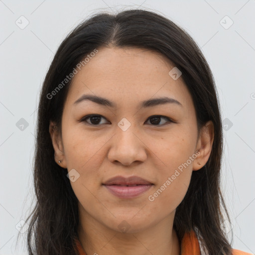 Joyful asian young-adult female with long  brown hair and brown eyes