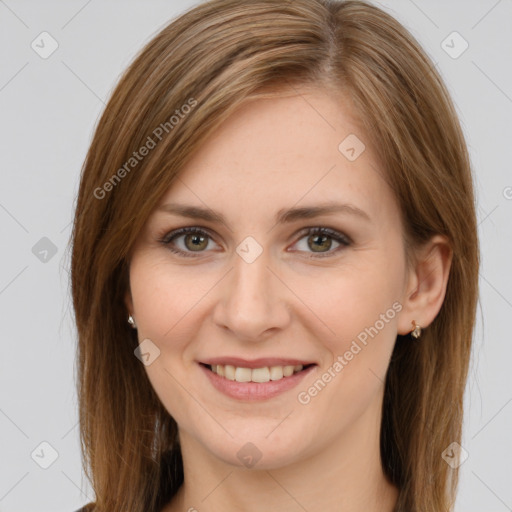 Joyful white young-adult female with long  brown hair and green eyes