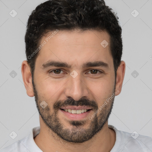 Joyful white young-adult male with short  black hair and brown eyes