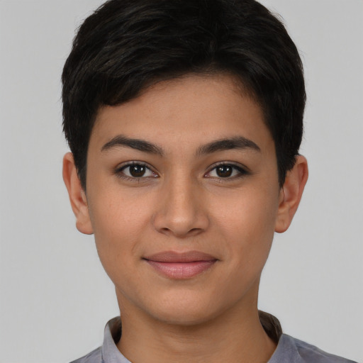 Joyful asian young-adult female with short  brown hair and brown eyes