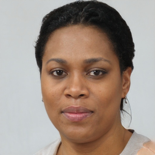Neutral black young-adult female with short  black hair and brown eyes