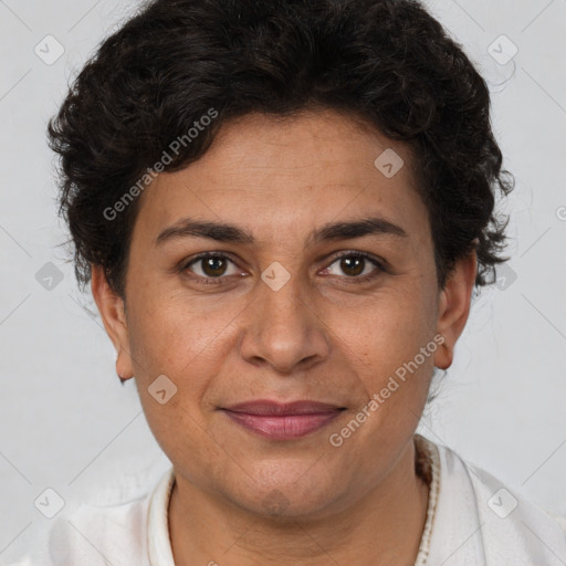 Joyful white adult female with short  brown hair and brown eyes