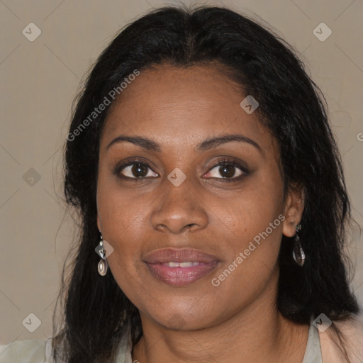 Joyful black young-adult female with medium  brown hair and brown eyes