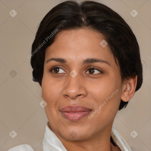 Joyful white adult female with medium  brown hair and brown eyes