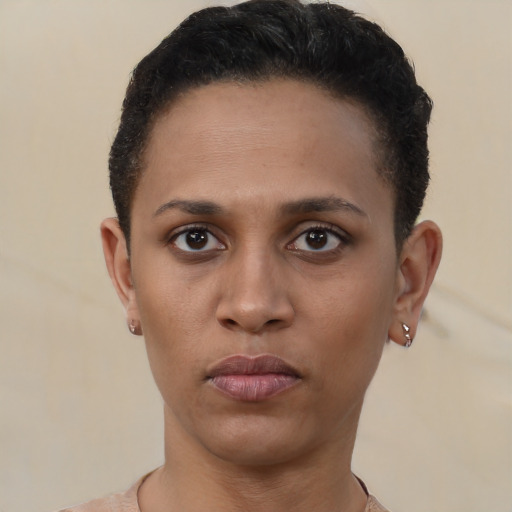 Neutral latino young-adult female with short  brown hair and brown eyes
