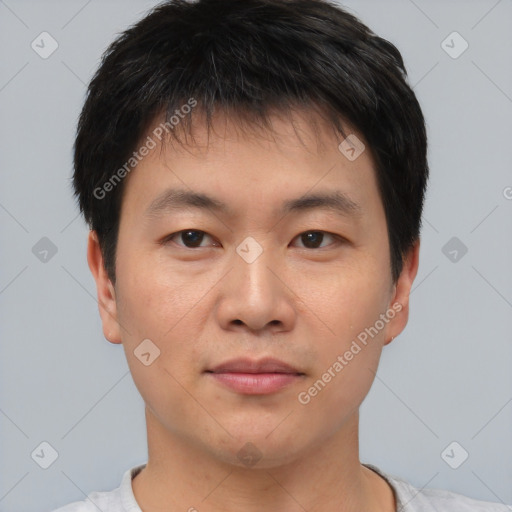 Neutral asian young-adult male with short  brown hair and brown eyes