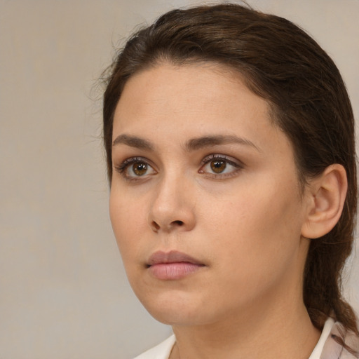 Neutral white young-adult female with medium  brown hair and brown eyes