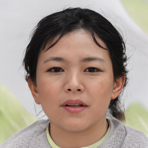 Neutral asian child female with short  brown hair and brown eyes