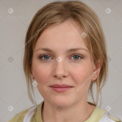 Joyful white young-adult female with medium  brown hair and blue eyes