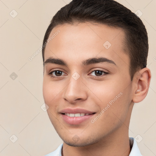 Joyful white young-adult male with short  brown hair and brown eyes