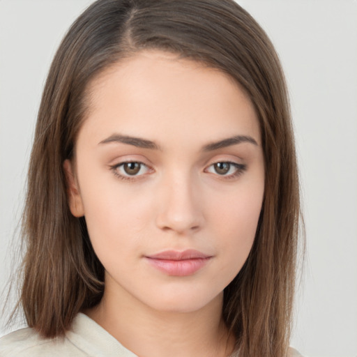 Neutral white young-adult female with long  brown hair and brown eyes