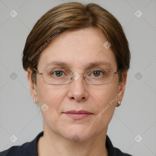 Joyful white adult female with short  brown hair and grey eyes